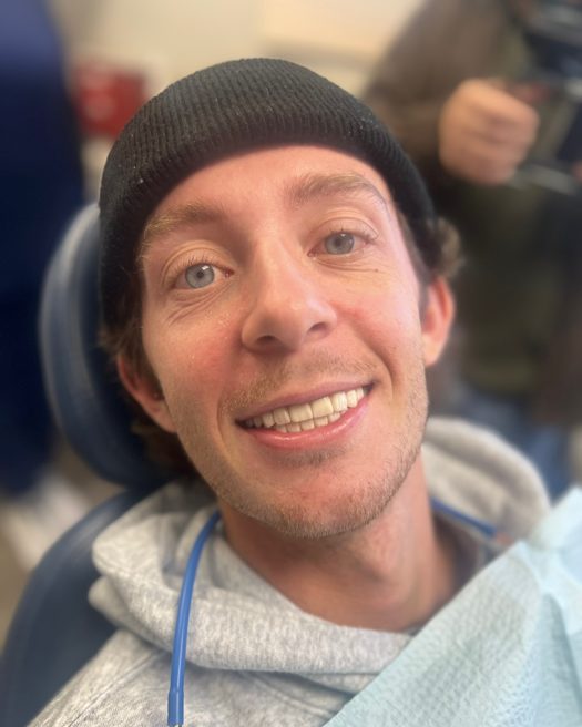 Patient smiling after treatment, photo 5