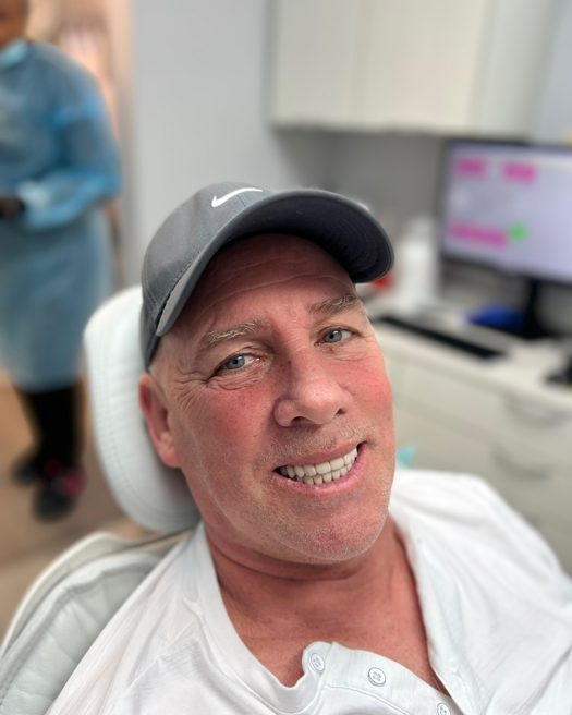 Patient smiling after treatment, photo 6